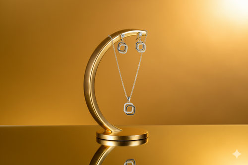 Silver-toned Necklace and Earings with a square-shaped,open worked design.