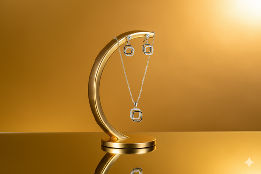 Silver-toned Necklace and Earings with a square-shaped,open worked design.