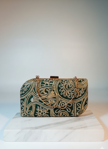 Bottled green and golden floral clutch
